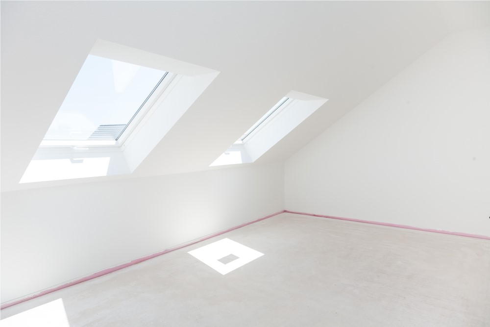 Interior room illuminated by two newly installed skylights