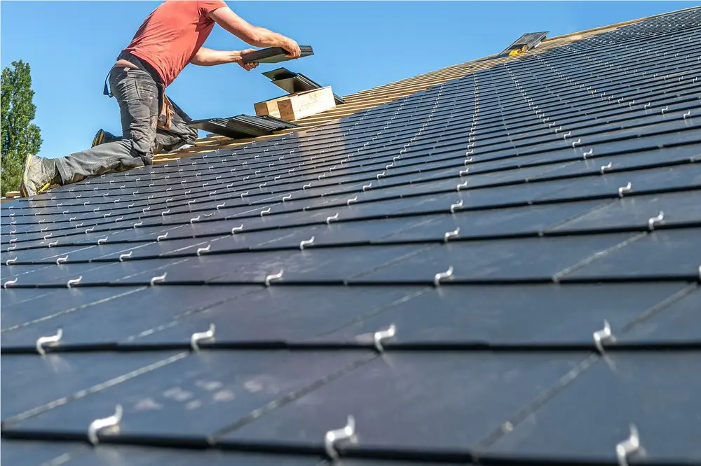 Slate roof installation in progress