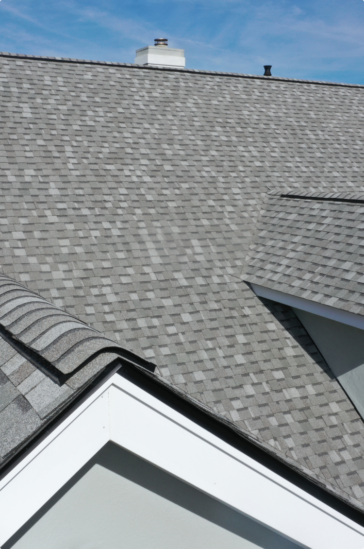 Close-up of newly installed architectural asphalt shingles on a Chicago roof