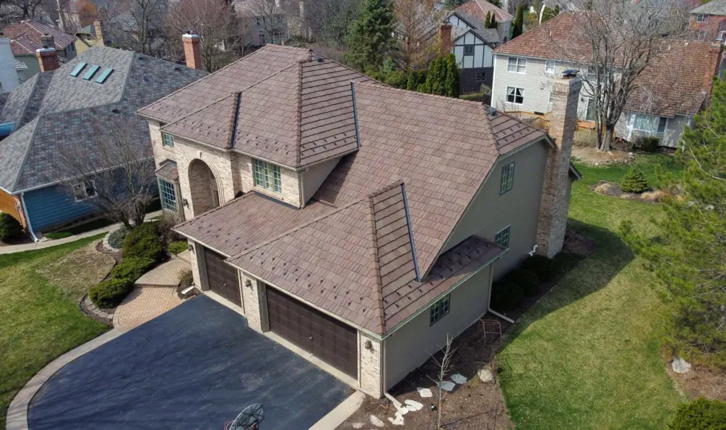 Aerial view of a home with a brown DaVinci synthetic shake roof