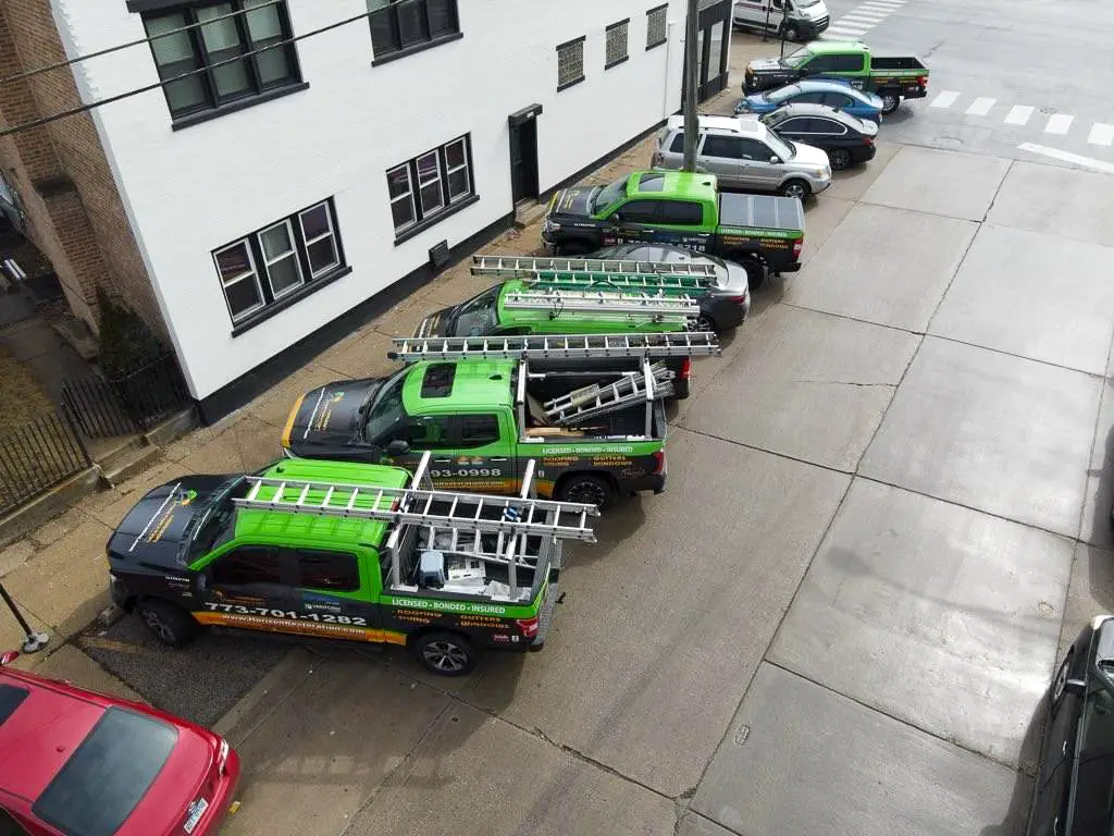 Horizon Restoration roofing company work trucks at the Chicago, IL office