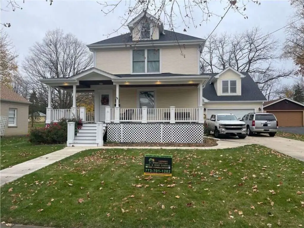 Roofing, gutter and door project on East Slade Street in Palatine, IL